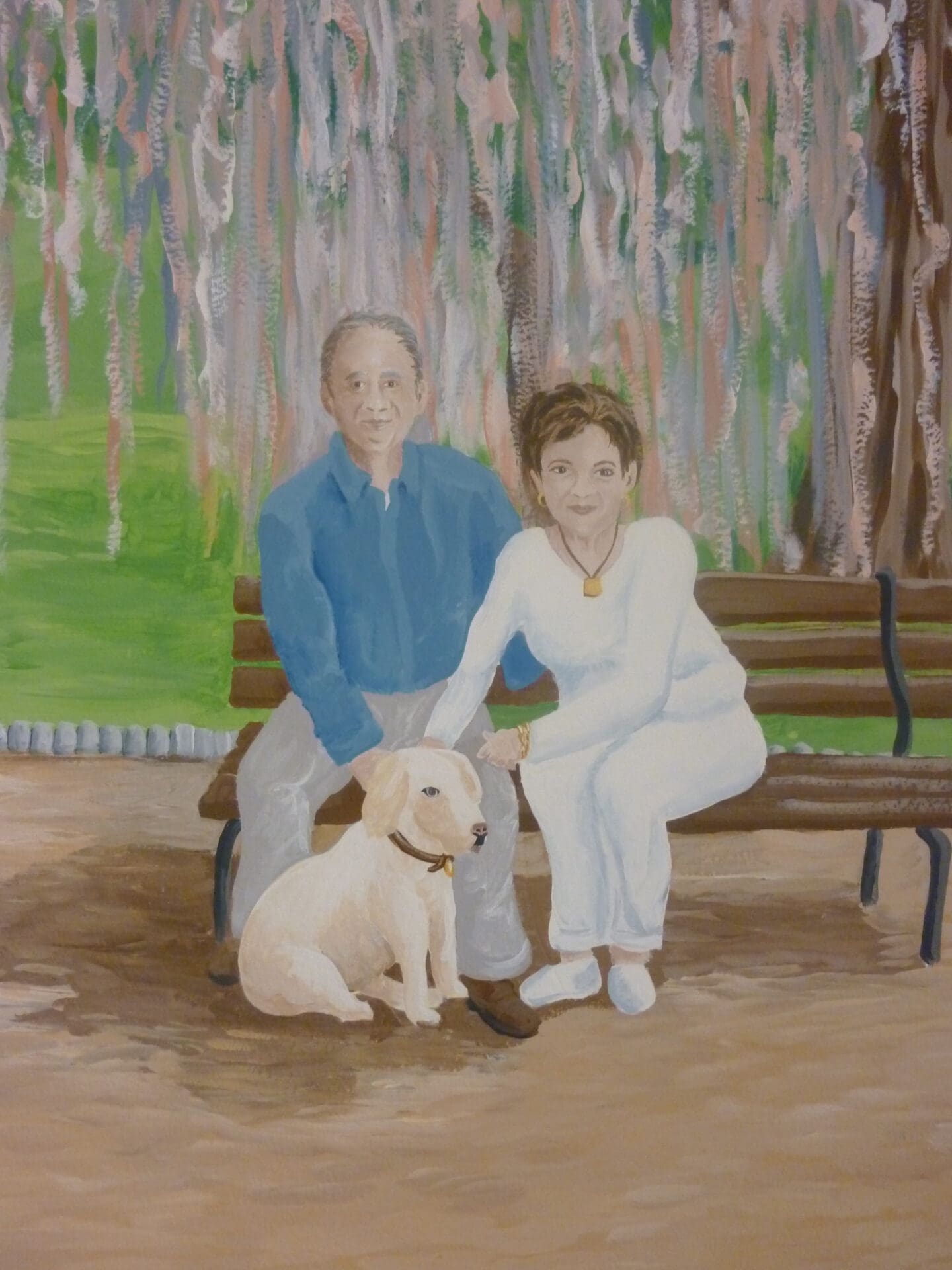 A Couple Sitting on a Bench With a White Dog