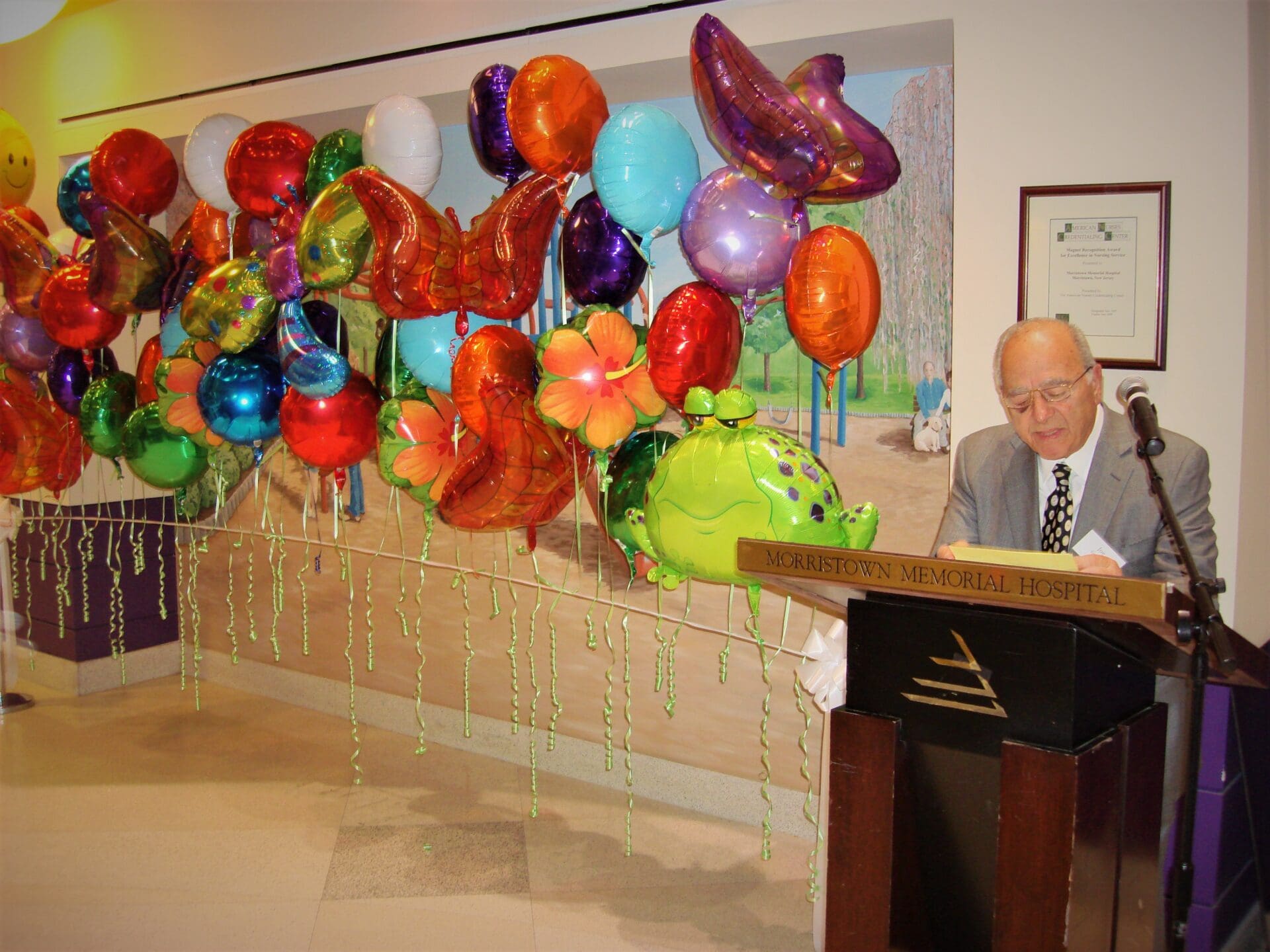 Mural Dedication by Joe Goryeb With Balloons Covering Mural