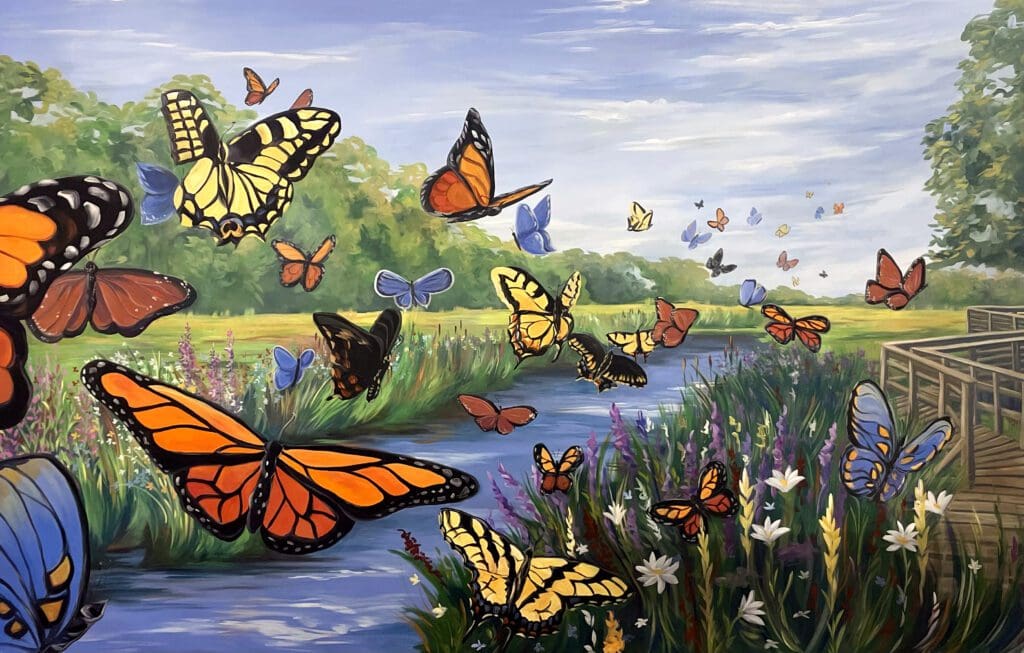 Butterflies flying over a vibrant riverside landscape.